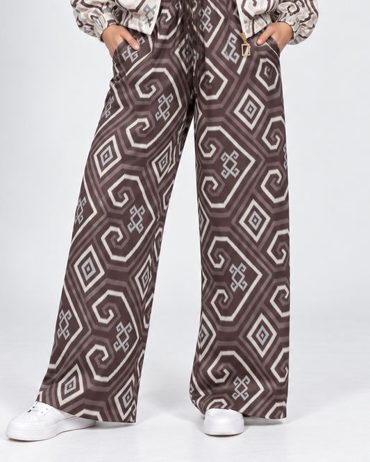 Mela Dotted Beige/Brown pants by TAS, front view with jacket worn open