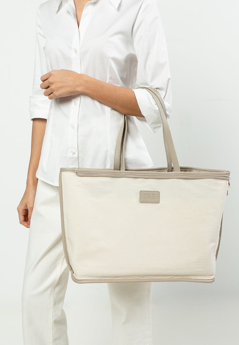 THE NIRA TOTE - IVORY TAUPE