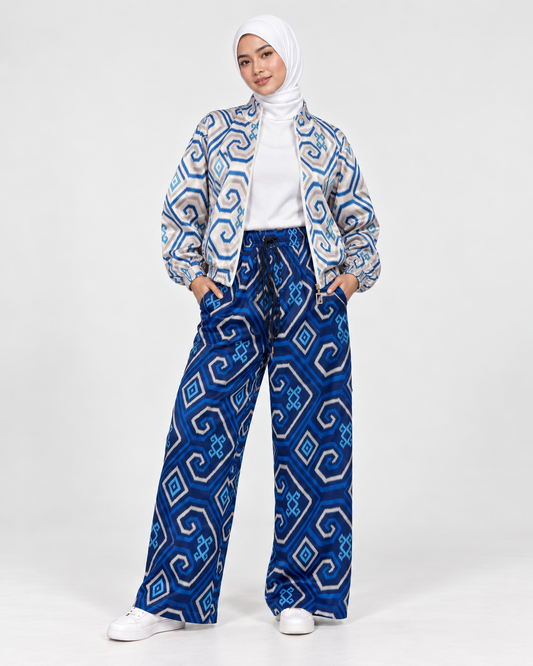 Mela Dotted Blue jacket worn open with matching pants by TAS